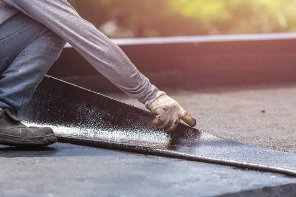 Professional Waterproofing technician working in Anniston, AL